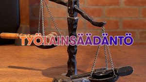 työlainsäädäntö vaaka jossa toisessa se ja toisessa työelämä.